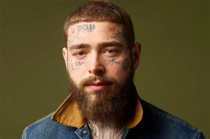 Unmasking the Phenomenon: The White Rapper with Tattoos on His Face